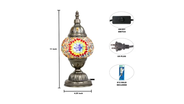 A Turkish mosaic lamp kit with a bronze base, colorful glass tiles, beads, glue, and instructions laid out on a workspace — designed for hands-on DIY assembly.
