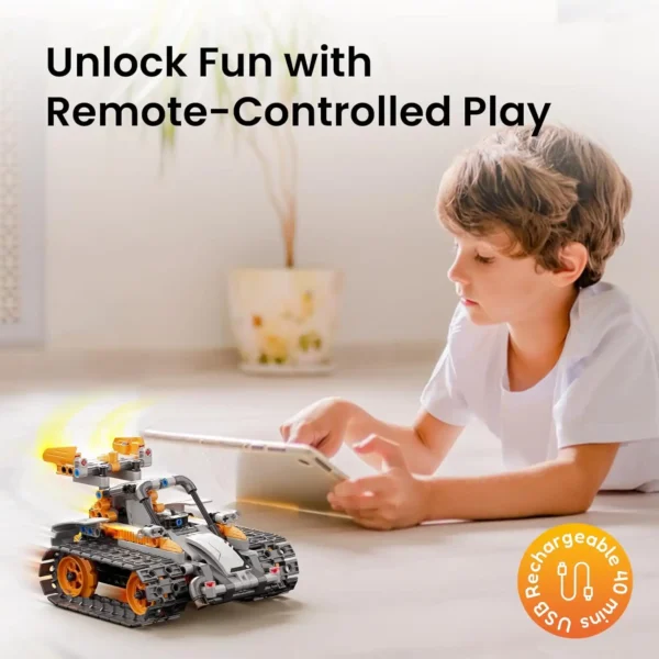 Young boy playing on the floor with a tablet, remotely controlling a tracked robot that’s in motion.