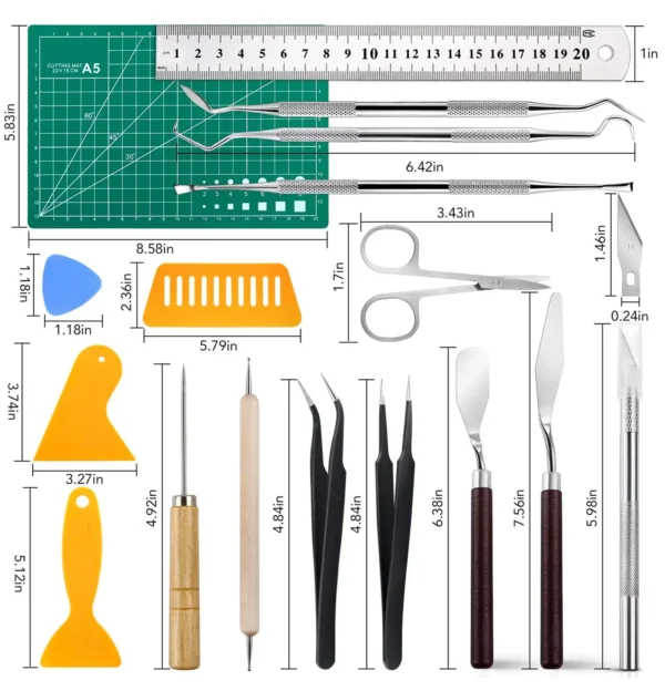 A complete sculpting and crafting kit with multiple precision tools, measuring mat, and rulers laid out with dimensions.
