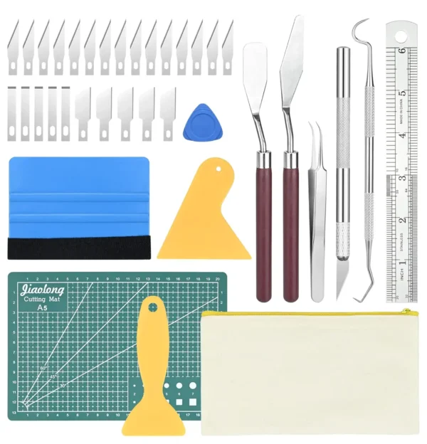 Polymer clay sculpting kit including precision tools, measuring mat, tweezers, spatulas, and extra blades.