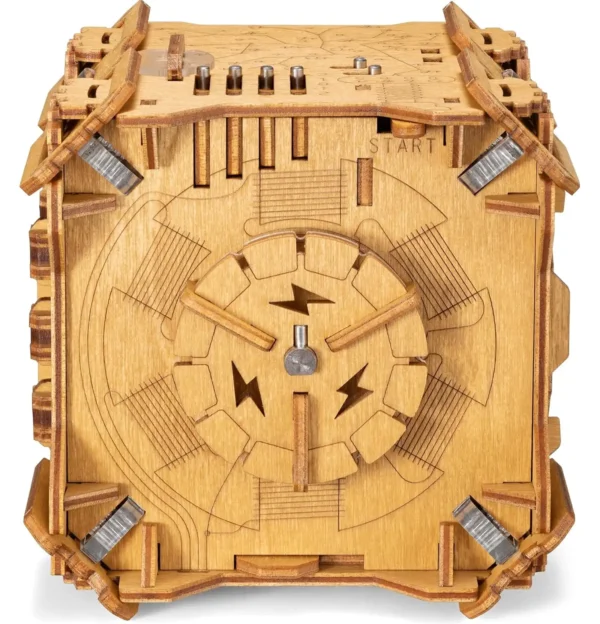 Plain wooden side of a mechanical puzzle box with engraved markings and a central rotating gear.