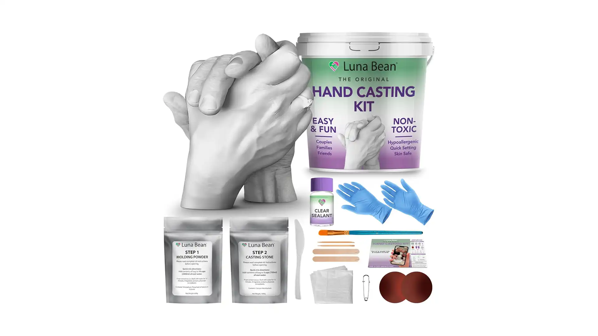 Hand Casting Kit 1 A complete hand casting kit with molding powder, casting stone, gloves, and tools, designed for creating detailed plaster sculptures of joined hands — perfect for couples, families, or keepsake gifts.